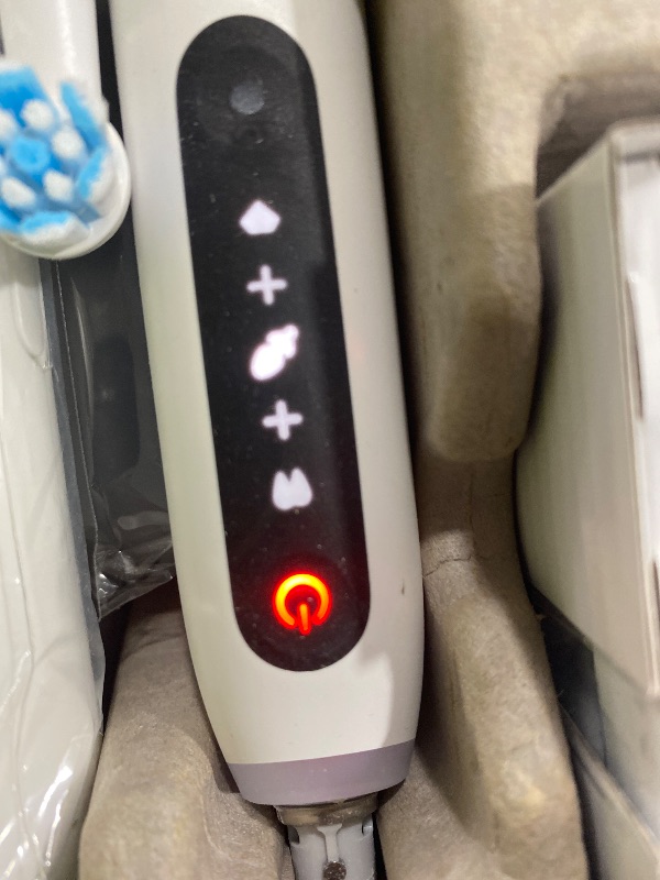 Photo 1 of Oral-B Rechargeable Electric Toothbrush, iO5 Limited Deep Clean & Whiten, 5 Cleaning Modes, Visual Pressure Sensor to Protect Gums, Travel Case, 3 Brush Heads, White