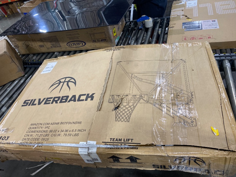 Photo 1 of Silverback NXT 54" Wall Mounted Basketball Hoop, Adjustable Height from 7.5’ to 10’ Indoor / Outdoor Basketball Hoop with QuickPlay Design, White, Alloy Steel