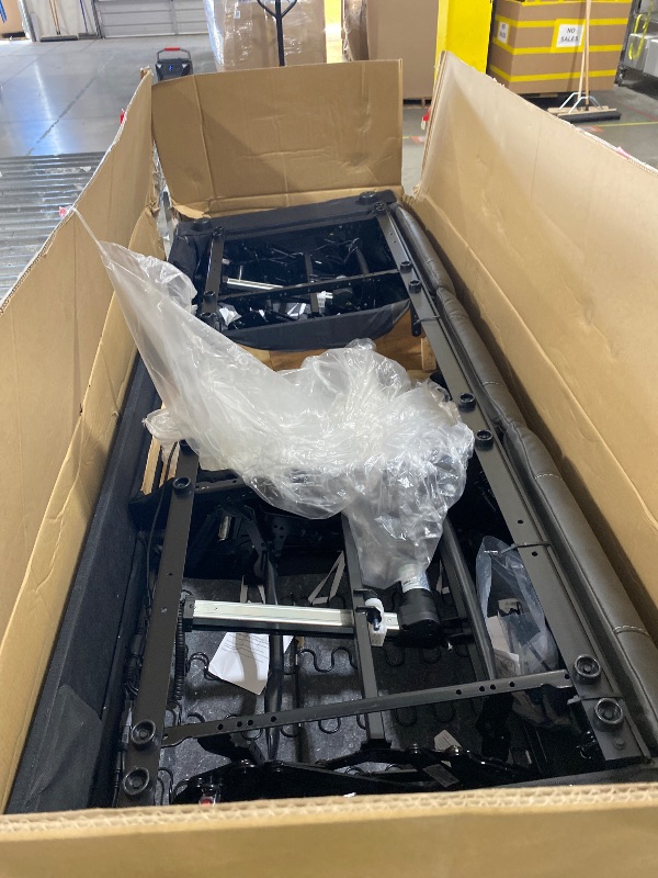 Photo 1 of Signature Design by Ashley Fyne-Dyme Contemporary Power Reclining Sofa with USB Charging Ports and Adjustable Headrest, Brown