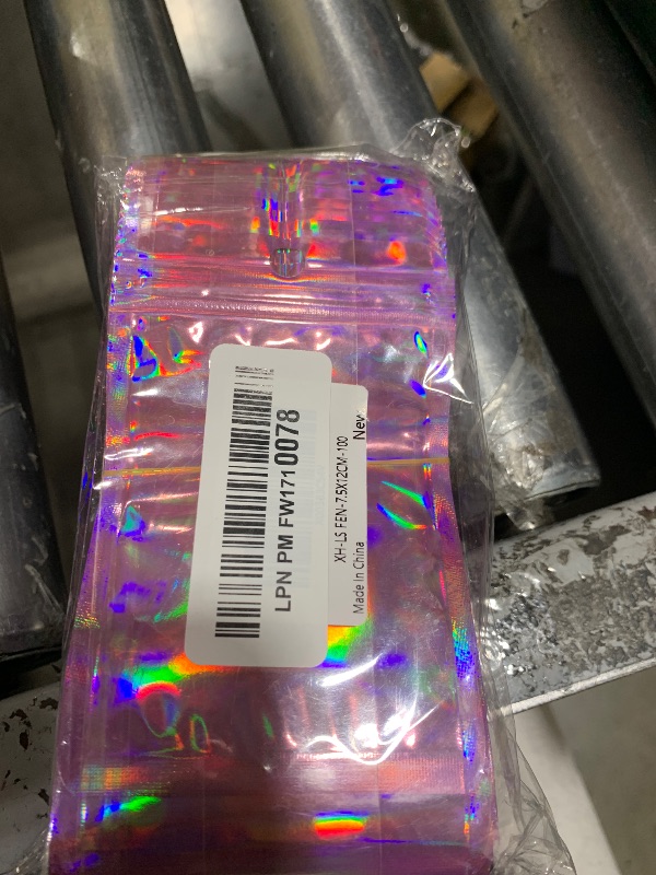 Photo 1 of 100 Pack Resealable Mylar Bags Smell Proof Bags Packaging Plastic Bag with Clear Holographic Rainbow Window Mylar Storage Bags For Candy,Jewelry,Screw (3 x 4.7 inch, Holographic Pink)