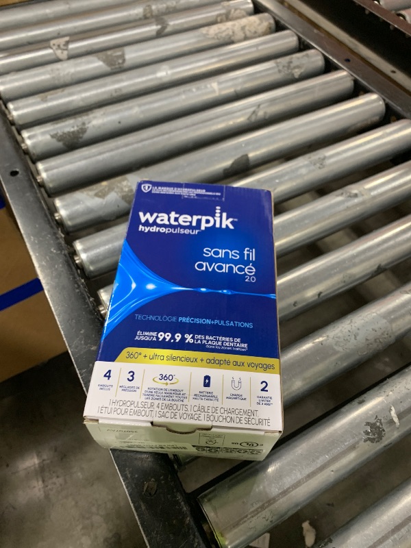 Photo 1 of Waterpik Cordless Advanced 2.0 Water Flosser For Teeth, Gums, Braces, Dental Care With Travel Bag and 4 Tips, ADA Accepted, Rechargeable, Portable, and Waterproof, White WP-580, Packaging May Vary
