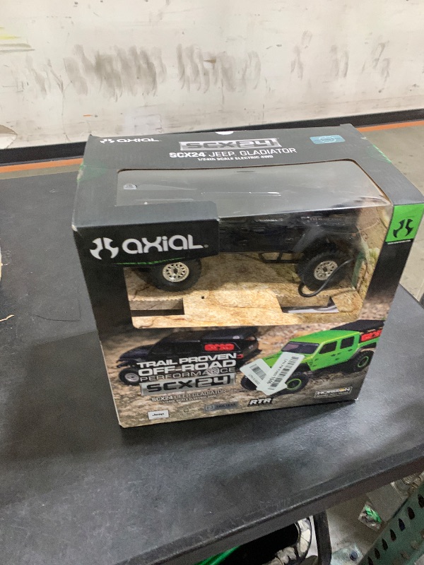 Photo 1 of Axial RC Truck SCX24 Jeep Gladiator 4 Wheel Drive Rock Crawler Brushed RTR (Nothing Needed to Complete Ready-to-Run), Black, AXI00005V2T5, Remote Control Car, RC Car, RC Crawler