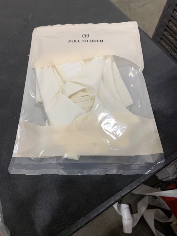 Photo 1 of Nebility Shapewear Bodysuits for Women Tummy Control Body Shaper Deep V Neck Thong Body Suits (White,Small)