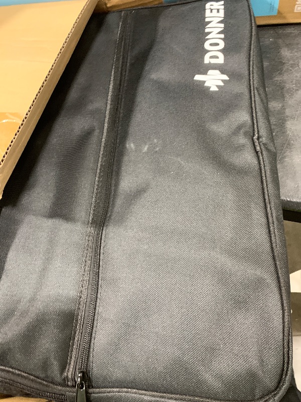 Photo 1 of Donner Beat Go Electronic Drum Set, Portable Electric Drum Kit with Training Lessons for Beginners, Compact Table Drum with Drumstick and Backpack, 180 Voices 30 Demo Songs 15 Drum Kits