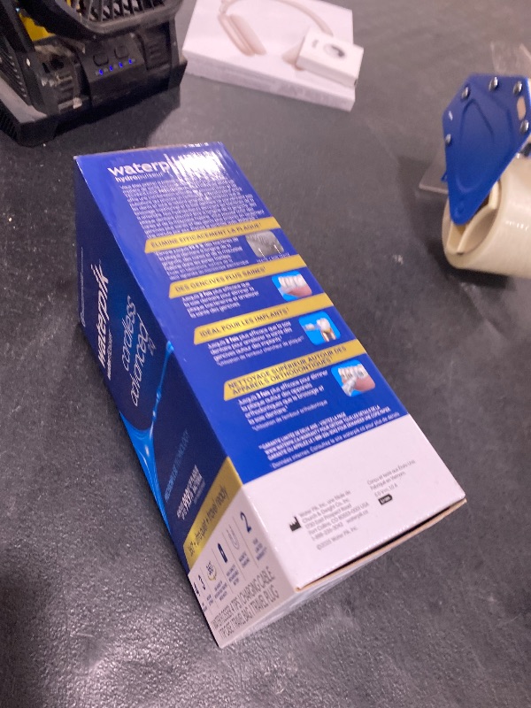 Photo 1 of Waterpik Cordless Advanced 2.0 Water Flosser For Teeth, Gums, Braces, Dental Care With Travel Bag and 4 Tips, ADA Accepted, Rechargeable, Portable, and Waterproof, White WP-580, Packaging May Vary