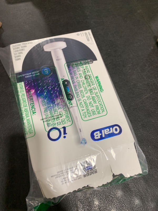 Photo 1 of Oral-B iO Series 8 Electric Toothbrush with 2 Replacement Brush Heads and Travel Case, Rechargeable Toothbrush, Whitealabaster