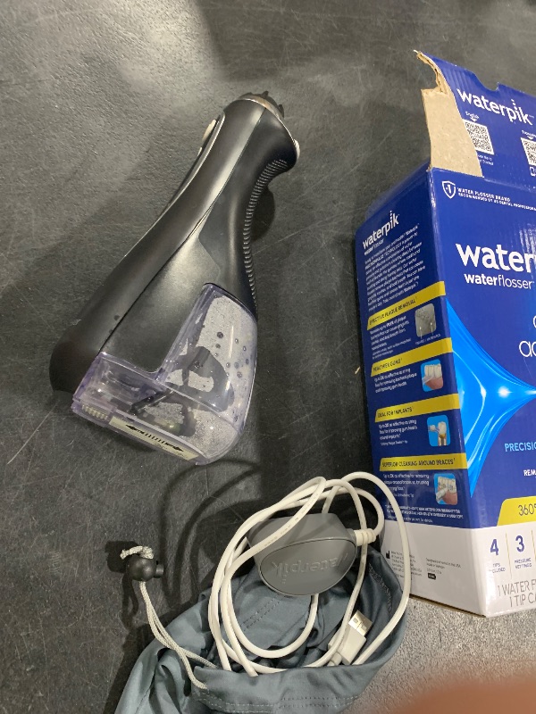 Photo 1 of Waterpik Cordless Advanced 2.0 Water Flosser For Teeth, Gums, Braces, Dental Care With Travel Bag and 4 Tips, ADA Accepted, Rechargeable, Portable, and Waterproof, Black WP-582, Packaging May Vary