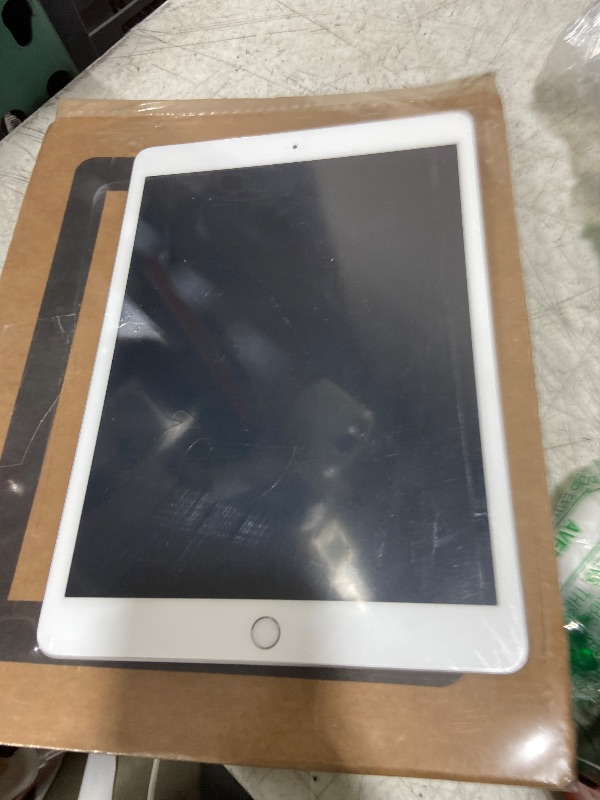 Photo 1 of Apple iPad (10.2-inch, Wi-Fi, 32GB) - Silver (Latest Model, 8th Generation) (Renewed)