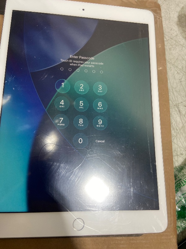 Photo 1 of Apple iPad (10.2-inch, Wi-Fi, 32GB) - Silver (Latest Model, 8th Generation) (Renewed)