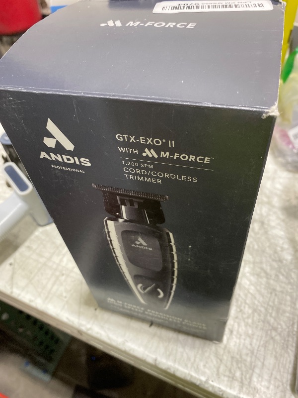 Photo 1 of Andis 562627 GTX-EXO II Professional Cordless Lithium-ion Electric Beard & Hair Trimmer with Charging Stand, Black Chrome