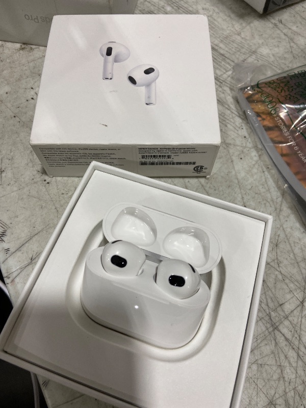 Photo 1 of Apple AirPods with Magsafe Charging Case (3rd Generation) (Renewed)