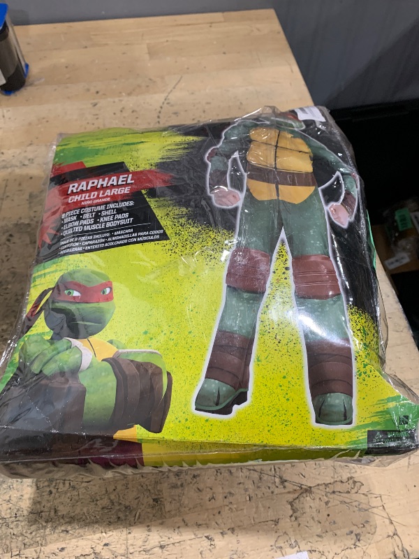 Photo 1 of **************MISSING THE MASK*************
Teenage Mutant Ninja Turtles Costumes for Boys - TMNT Halloween Costume for Kids with Muscle Bodysuit, Mask, Shell, More (Raphael, 12-14)