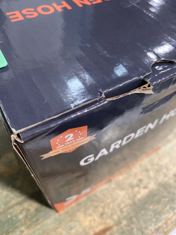 Photo 1 of *****************MISSING NOZZLE***************
Giraffe Tools Garden Hose 25FT Lightweight Lay Flat Water Hose Kink Free Flexible Hose with 9 Spray Function Nozzle, Black