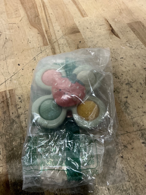 Photo 1 of **ISSUES WITH SUCTION CUP STICKING** Itzy Ritzy Pop & Whirl – Fidget Spinner Travel & Bath Toy for Babies & Toddlers – Fidget w/Textured Silicone Popper to Develop Fine Motor Skills –Sticks to Highchairs, Tables, Tubs, More (Strawberry)