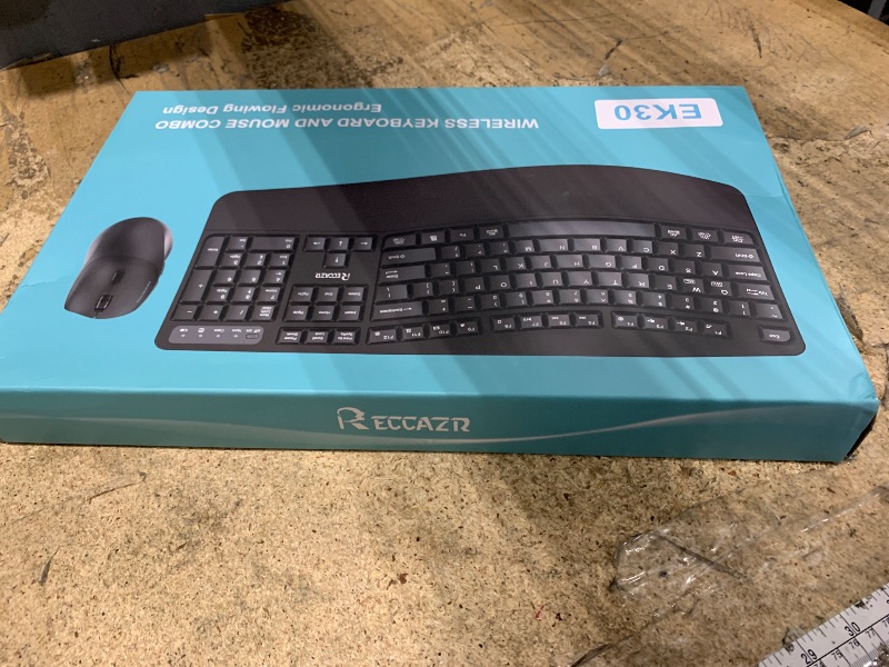 Photo 1 of **HAS ISSUES FUNCTIONING POSSIBLY FOR PARTS** Wireless Keyboard and Mouse Combo,2.4G Full Size Wave Keys Ergonomic Keyboard with Wrist Rest for Natural Typing, 3 DPI Adjustable Ergonomic Silent Mouse for Computer/Laptop/Windows/Mac (Black)