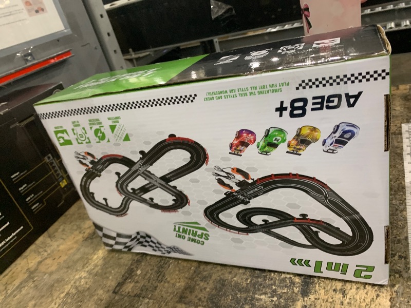 Photo 1 of 2 in 1 Slot Car Race Track Sets with 4 Slot Cars, 1:43 Electric Car Track for Boys, Dual Racing Game Lap Counter Circular Slope Track Sets, Birthday Gifts Toys for Boys Kids Ages 6 7 8 9 10 11 12