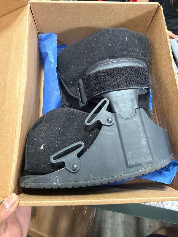 Photo 1 of (used) United Ortho USA14115 Short Air Cam Walker Fracture Boot, Medium, Black