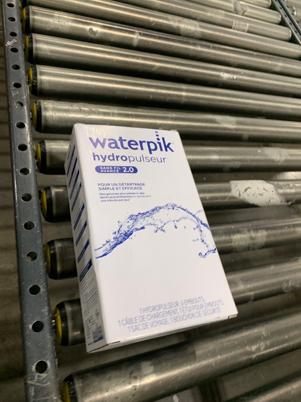 Photo 1 of Waterpik Cordless Advanced 2.0 Water Flosser For Teeth, Gums, Braces, Dental Care With Travel Bag and 4 Tips, ADA Accepted, Rechargeable, Portable, and Waterproof, Blue WP-583, Packaging May Vary