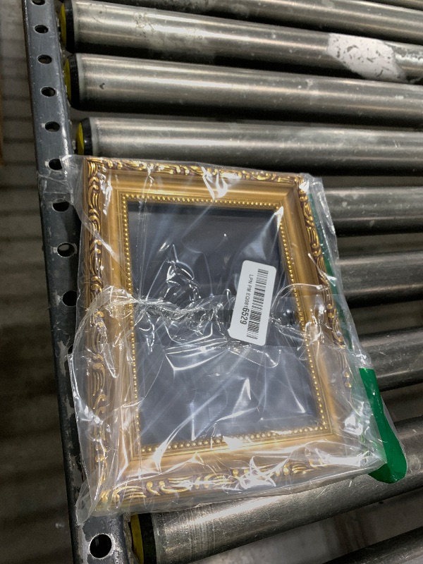 Photo 1 of eletecpro 5x7 Picture Frames Set of 4, Vintage Gold Photo Frames with Glass, Displays 4x6 Photo with Mat