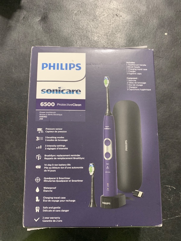 Photo 1 of PHILIPS Sonicare Protective Clean 6500 Rechargeable Electric Toothbrush with Charging Travel Case and Extra Brush Head, Deep Purple, 2 Count