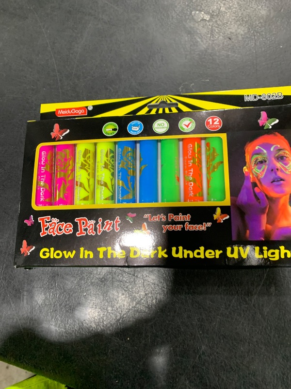 Photo 1 of 12 PCS Glow Face Body Paint, Glow In The Dark Under UV Black Light Sticks Makeup Neon Face Painting Kits for Adult Halloween Festival Accessory Glow Party Supplies