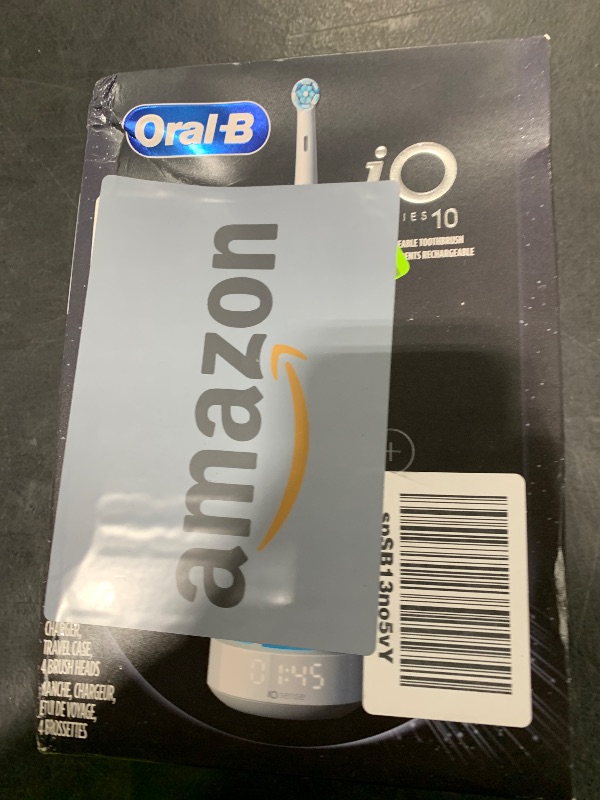 Photo 1 of Oral-B iO Series 10 Rechargeable Electric Toothbrush with Visible Pressure Sensor to Protect Gums, 2 Min Timer, 7 Cleaning Settings, 4 Replacement Toothbrush Heads, and Charging Travel Case, White