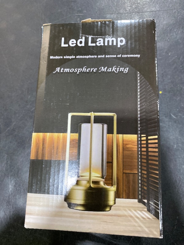 Photo 1 of Portable Metal Table Lamp,Cordless Table Lamp, Rechargeable Battery Powered Portable LED Desk Lamp, 3 Color Stepless Dimming Touch, for Bedroom Restaurant Home Outdoor (Silver)