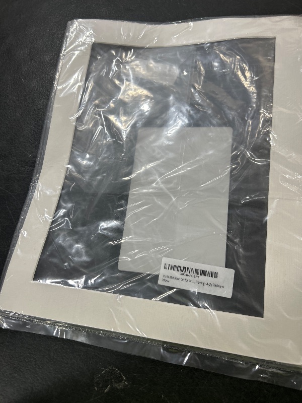 Photo 1 of Poster Palooza 11x14 Mat Bevel Cut for 9x12 Photos - Acid Free Textured White Precut Matboard - For Pictures, Photos, Framing - 4-ply Thickness