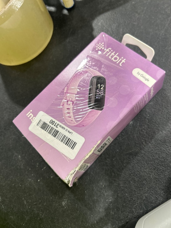 Photo 1 of Fitbit Inspire 3 Health &-Fitness-Tracker with Stress Management, Workout Intensity, Sleep Tracking, 24/7 Heart Rate and more, Lilac Bliss/Black, One Size (S & L Bands Included)