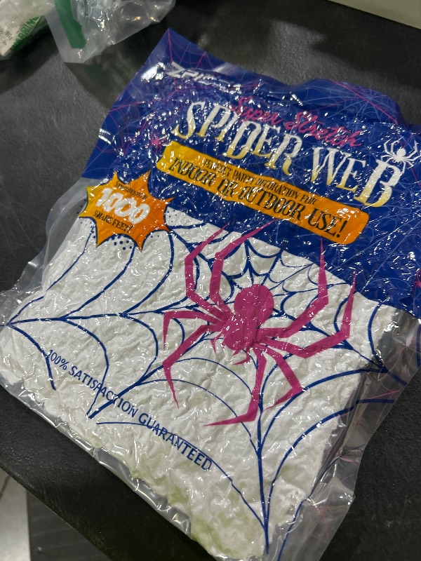 Photo 1 of 1000 sqft Spider Webs Halloween Decorations Bonus with 30 Fake Spiders, Super Stretch Cobwebs for Halloween Indoor and Outdoor Party Supplies