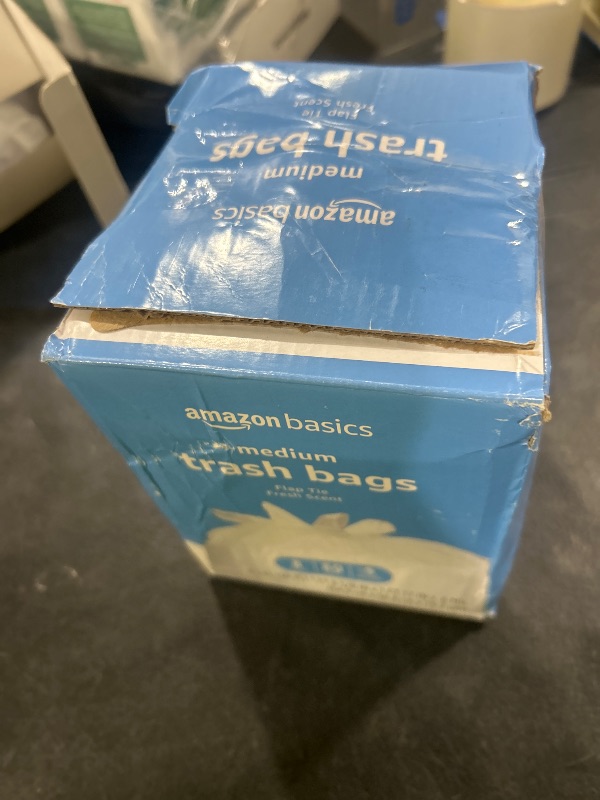 Photo 1 of Amazon Basics 8 Gallon Flap Tie Trash Bags, 80 Count Fresh Scent