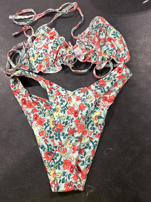 Photo 1 of WOMENS BATHING SUIT SIZE 4 