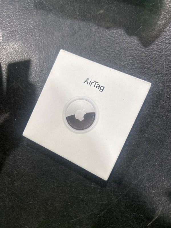 Photo 1 of Apple AirTag. Keep Track of and find Your Keys, Wallet, Luggage, Backpack, and More. Simple one-tap Set up with iPhone or iPad