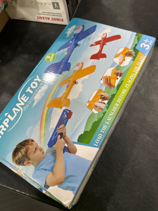 Photo 1 of Fuwidvia 3 Pack Airplane Launcher Toys, 13.2'' LED Foam Glider Plane Toy for Boys, 2 Flight Modes Outdoor Flying Toys Birthday Gifts for Boys Girls 4 5 6 7 8 9 10 11 12 Year Old (Blue&Green&Orange)