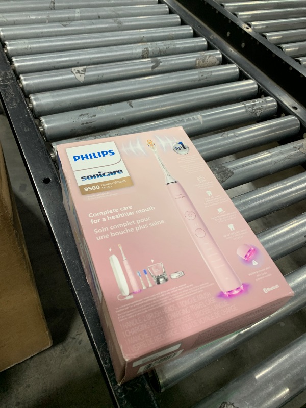 Photo 1 of Philips Sonicare DiamondClean Smart 9500 Electric Toothbrush, Sonic Toothbrush with App, Pressure Sensor, Brush Head Detection, 5 Brushing Modes and 3 Intensity Levels, Pink, Model HX9923/21