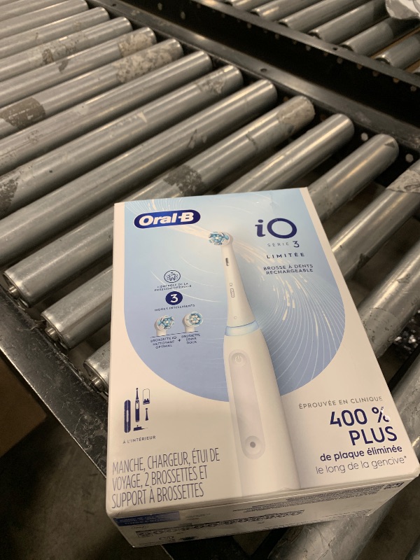Photo 1 of Oral-B iO Deep Clean Rechargeable Electric Powered Toothbrush, White with iO Series 3 Limited, 2 Brush Heads and Travel Case - Pressure Sensor to Protect Gums - 3 Cleaning Settings - 2 Minute Timer