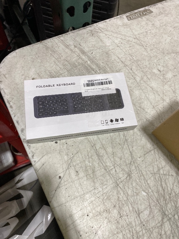 Photo 1 of Foldable Bluetooth Keyboard, Folding Wireless Keyboard with Trackpad and Numeric Keypad, Portable Travel Keyboards for iPad Tablet Smartphone Laptop PC Windows iOS Android, Black