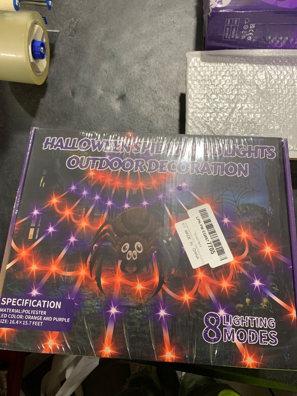 Photo 1 of Halloween Spider Web Lights Giant Spider, 16.4Ft 450 LED Lighted Spider Web with with 8 Lighting Modes Waterproof & Timer for Indoor Outdoor House Haunted Yard Decor,Purple&Orange