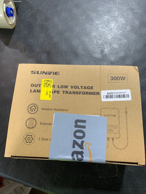 Photo 1 of SUNVIE 300W Low Voltage Landscape Transformer with 2 Independent Control Output Landscape Lighting Transformer with Timer and Photocell Sensor 120V AC to 12/14V AC Weatherproof Low Voltage Transformer