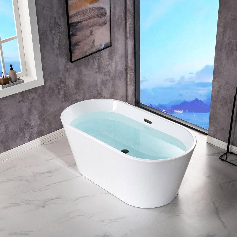 Photo 1 of WOODBRIDGE 54" Acrylic Freestanding Bathtub Contemporary Soaking White Tub with Matte Black Overflow and Drain,B1702-MB