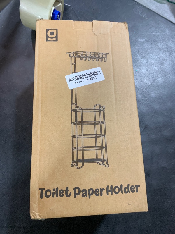 Photo 1 of Goozii Gold Free Standing Toilet Paper Holder Stand with Phone Shelf, Floor Bathroom Tissue Holder for Large Mega Rolls, Metal Freestanding Toilet Paper Roll Holder with Wipes Storage Tray