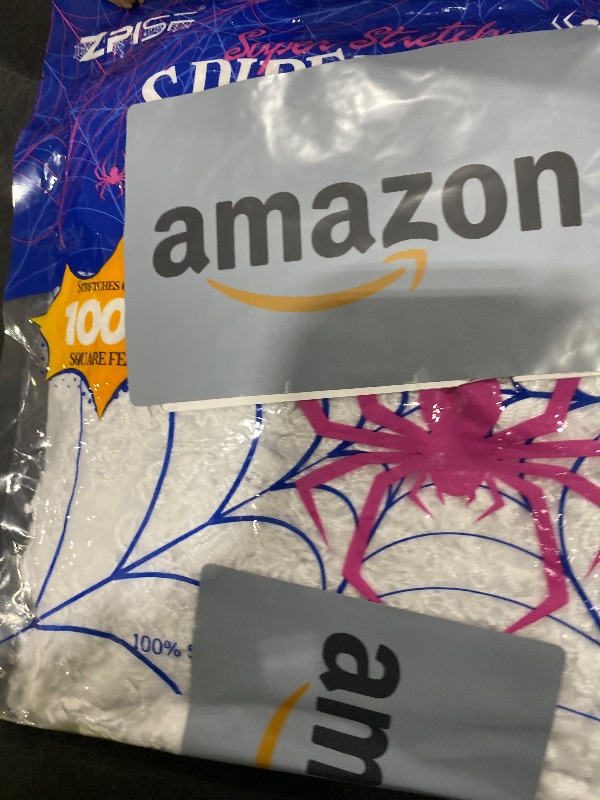 Photo 1 of 1000 sqft Spider Webs Halloween Decorations Bonus with 30 Fake Spiders, Super Stretch Cobwebs for Halloween Indoor and Outdoor Party Supplies