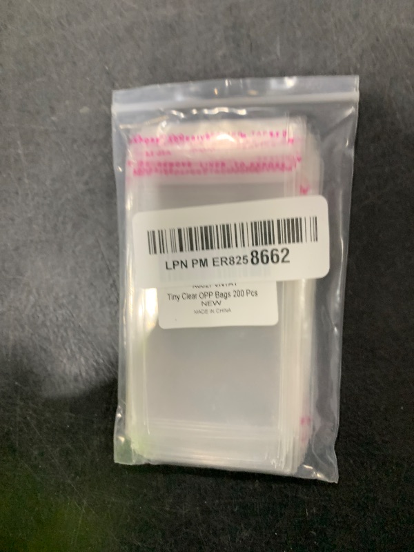 Photo 1 of 30Pcs Cellophane Bags 2x3 Inches Self Sealing Cello Bags Small Clear Cookie Bag Adhesive Resealable Plastic Poly Cellophane Treat Bag for Candy Jewelry Gifts Decorative Favor