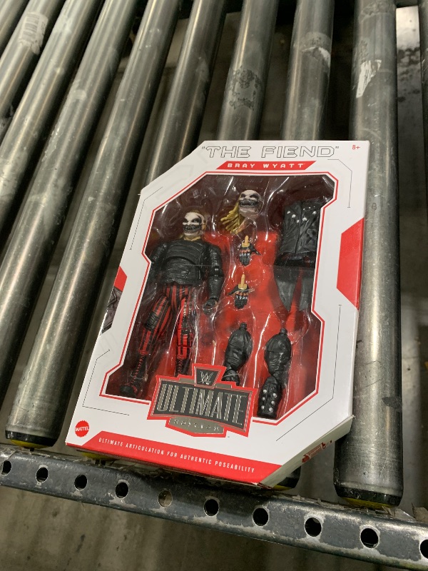 Photo 1 of Mattel WWE Ultimate Edition Action Figure & Accessories Set, "The Fiend" Bray Wyatt 6-inch Collectible with 30 Articulation Points, Swappable Pieces & Entrance Gear
