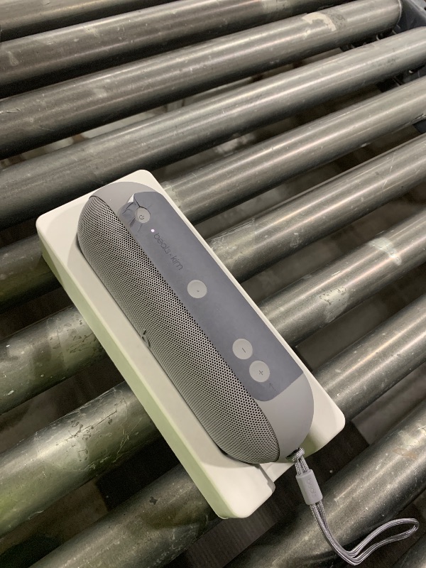 Photo 1 of Beats Pill x Kim Kardashian - Wireless Bluetooth Speaker and Portable Charger via USB-C - Up to 24 Hours Battery Life, IP67 Water Resistant, Apple & Android Compatible, Built-in Mic – Dark Gray
