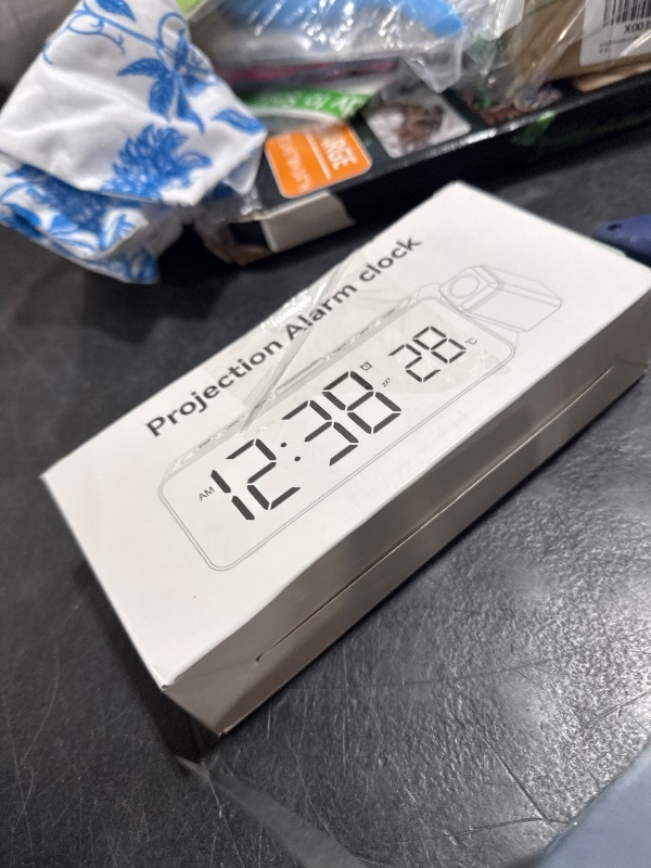 Photo 1 of Netzu Projection Alarm Clock for Bedroom Ceiling, Small Compact Plug-in Digital Clocks with 180° Rotatable Projector, Temperature 4 Levels Birghtness, 3 Volumes and Snooze (RGB)