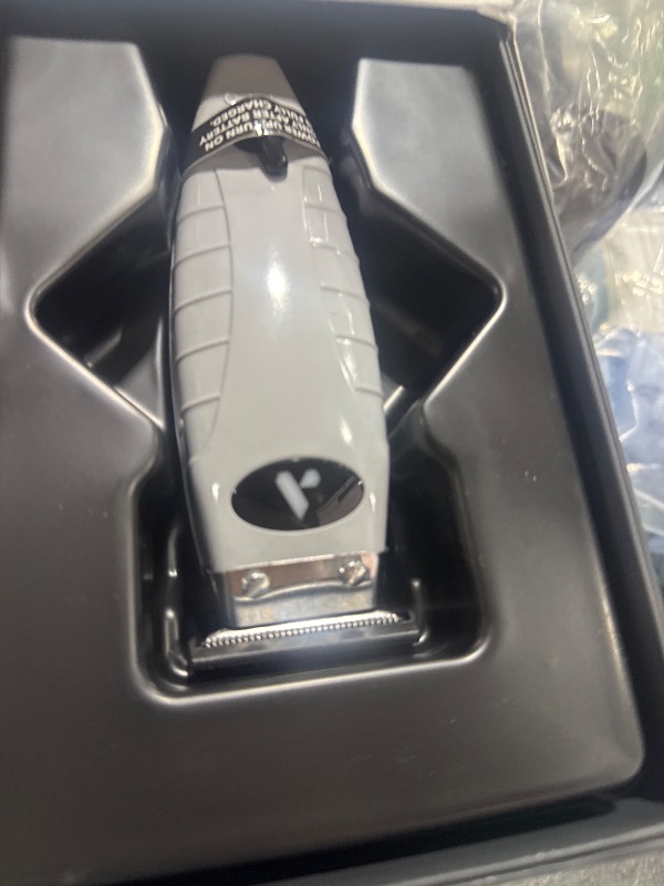 Photo 1 of Andis 74055 Professional Corded/Cordless Hair & Beard Trimmer, Zero Gapped, Close Cutting Carbon Steel T-Outliner Blade, Grey
