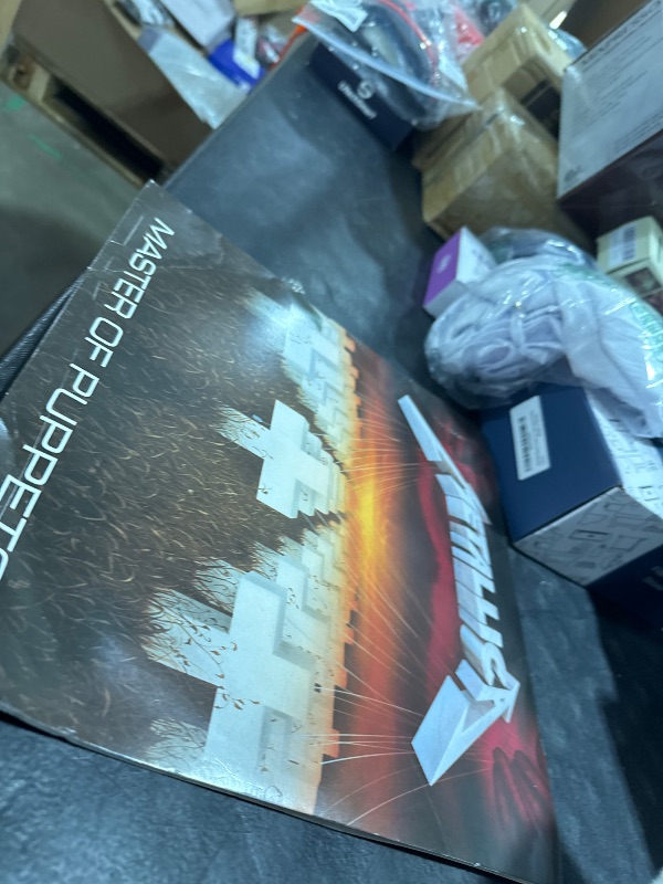 Photo 1 of Master Of Puppets - Exclusive Limited Edition Battery Brick Red Colored Vinyl LP