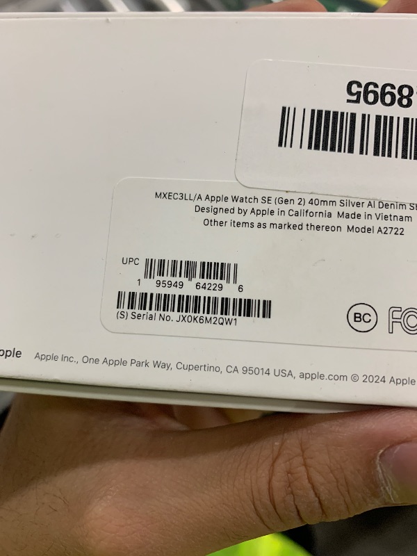 Photo 1 of Apple Watch SE (2nd Gen) [GPS 40mm] Smartwatch with Silver Aluminum Case with Denim Sport Band S/M. Fitness and Sleep Trackers, Crash Detection, Heart Rate Monitor, Retina Display