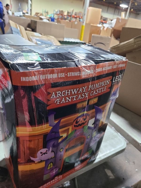 Photo 1 of 11FT Giant Halloween Inflatables Pumpkin Castle Archway with Ghost and Trick or Treat LED Lights 2025 Outdoor Blow up Haunted House Arch for Outside Yard, Lawn,Patio,Garden Party Decor